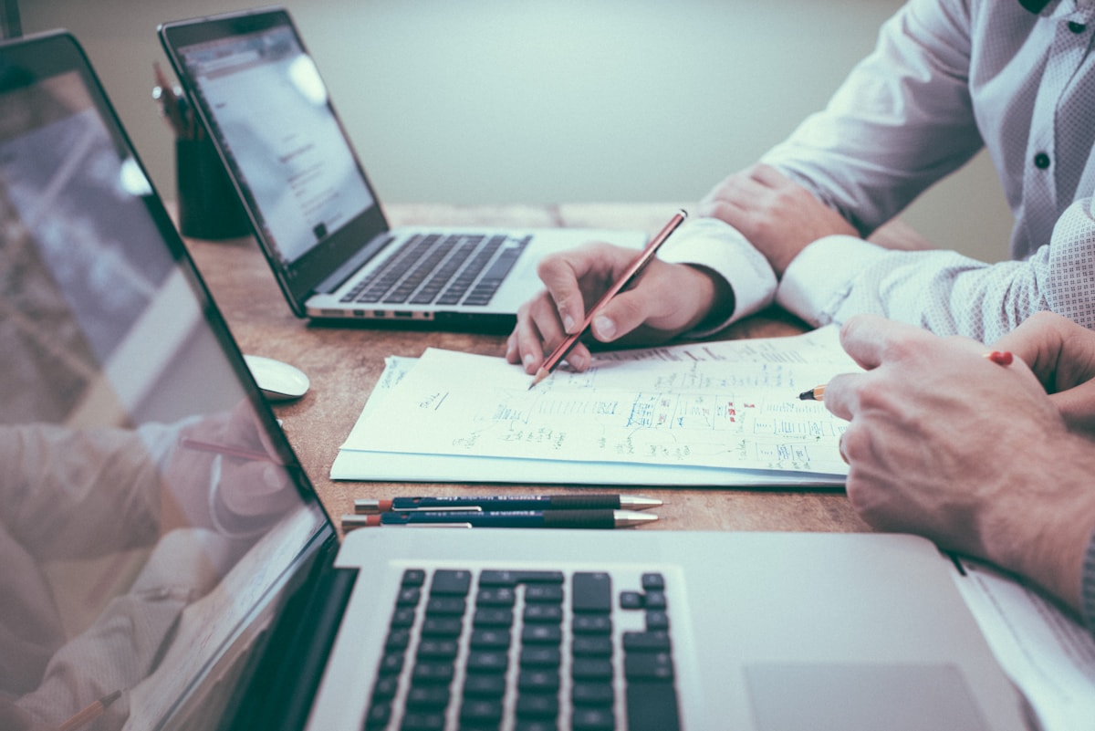 Accounting professionals reviewing financial records together